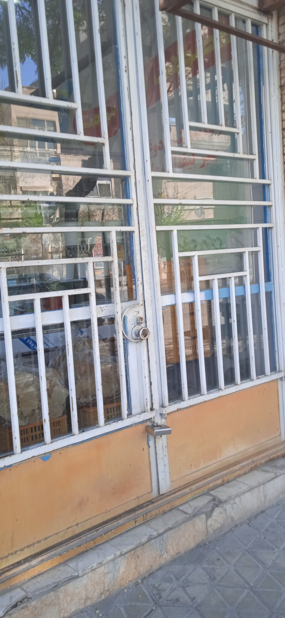 درب آهنی چهار لنگه مغازه کارگاه